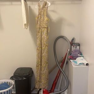 Beautiful jump suit. Never worn. Size small.